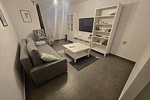 Квартира с тремя комнатами в Изола.