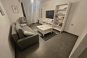 Квартира с тремя комнатами в Изола.