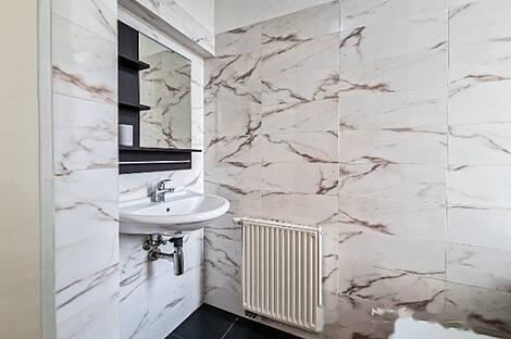 Трехкомнатная квартира в центре города Ново Любляна.: 12